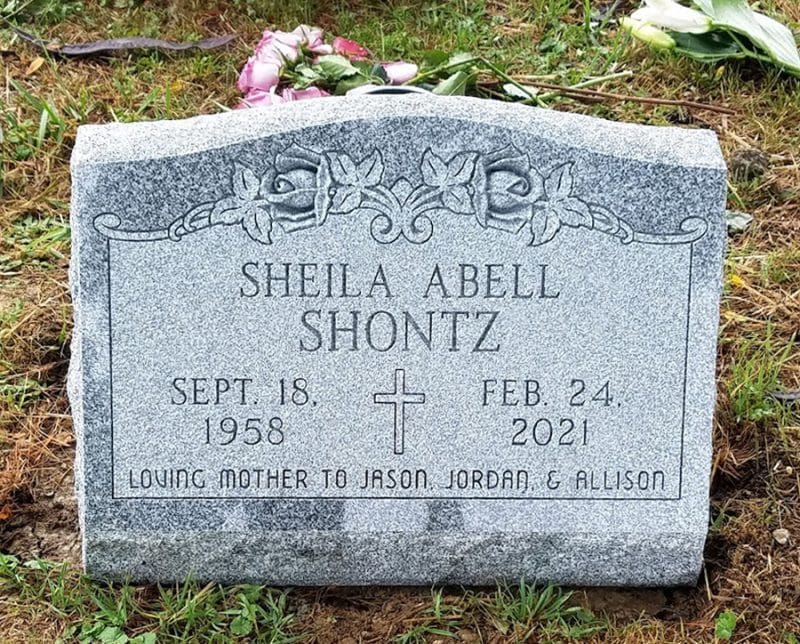 Shontz Classic Slant Memorial with Roses and Cross Carving