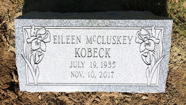 Kobeck Iris Carving on Gray Granite